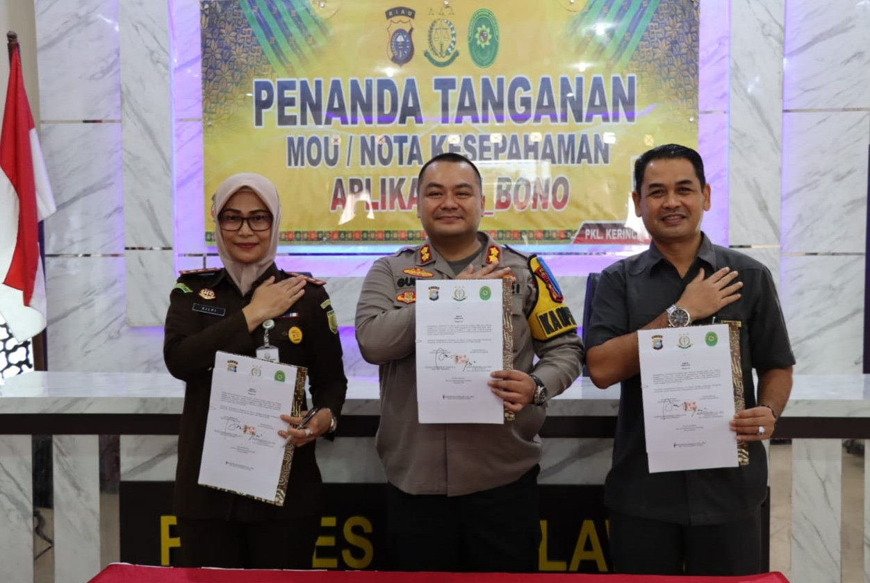 Kapolres Pelalawan Tandatangani MoU Nota Kesepahaman Penggunaan Aplikasi SIBONO